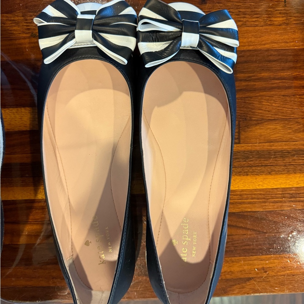 2 pairs Women’s shoes- size 8. 1 from Tory Burch & 1 flats from Kate Spade